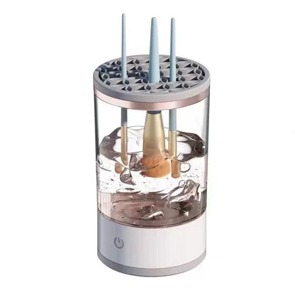 Limpiador de brochas eléctrico girando con líquido